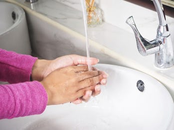 Woman wash hands